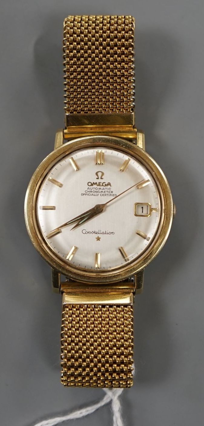 A gentleman's steel and gold plated Omega Constellation automatic wrist watch, on associated flexible strap, case diameter 35mm.